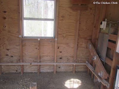 Coop with roosts and droppings boards removed for semi-annual cleaning. Coop with roosts and droppings boards removed for semi-annual cleaning.